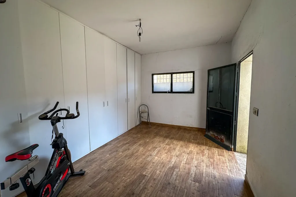 Sala polivalente de la vivienda en Calle San Bartolomé